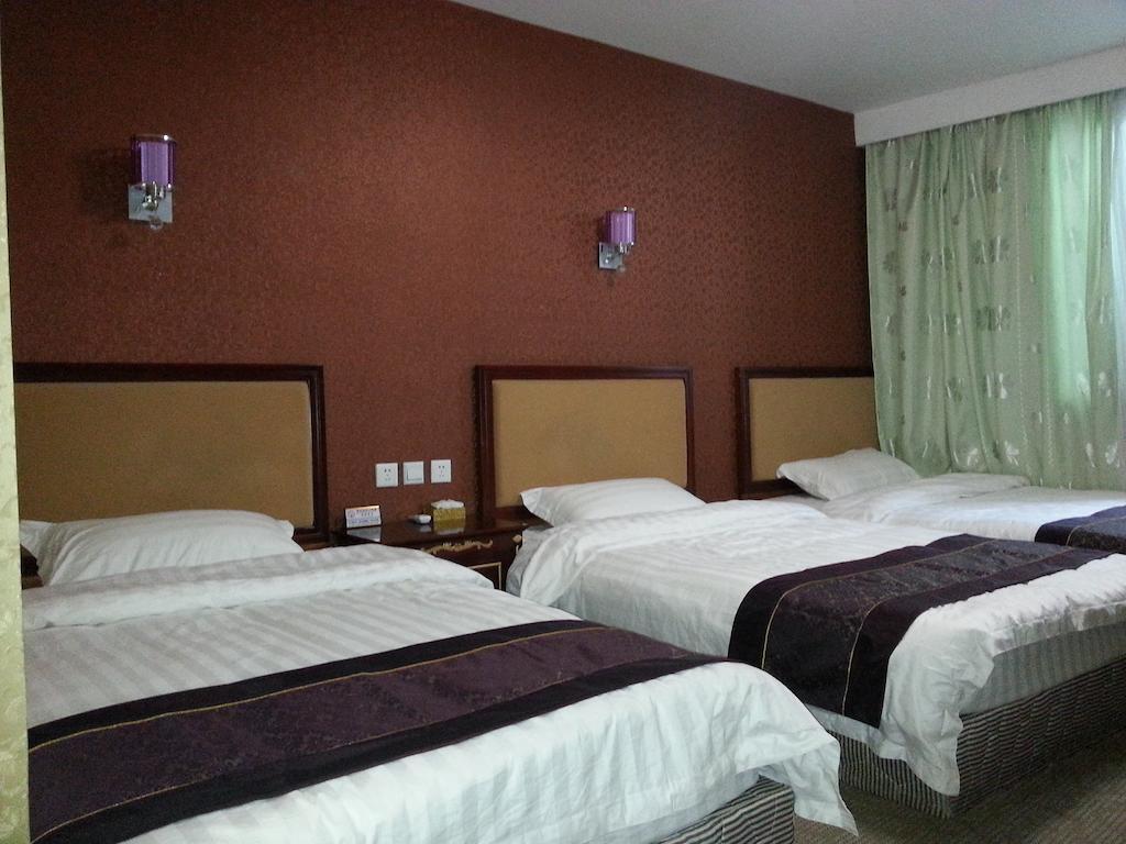 Jiuxiang Hotel Jiuzhaigou Cameră foto