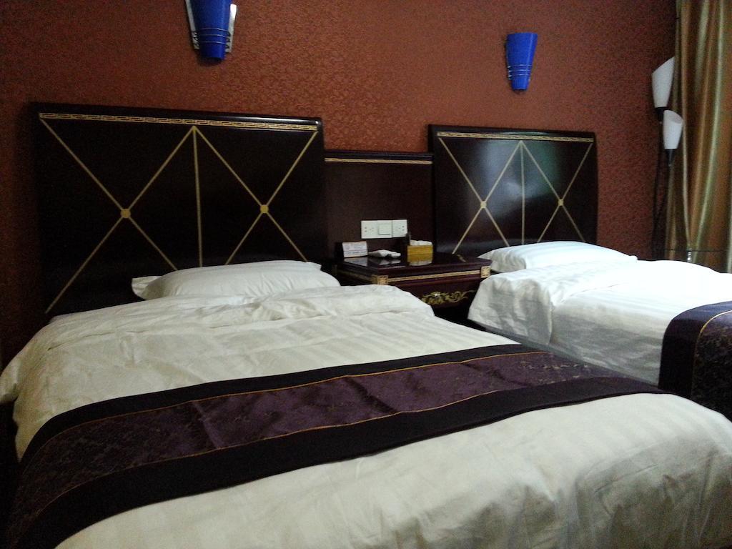 Jiuxiang Hotel Jiuzhaigou Cameră foto