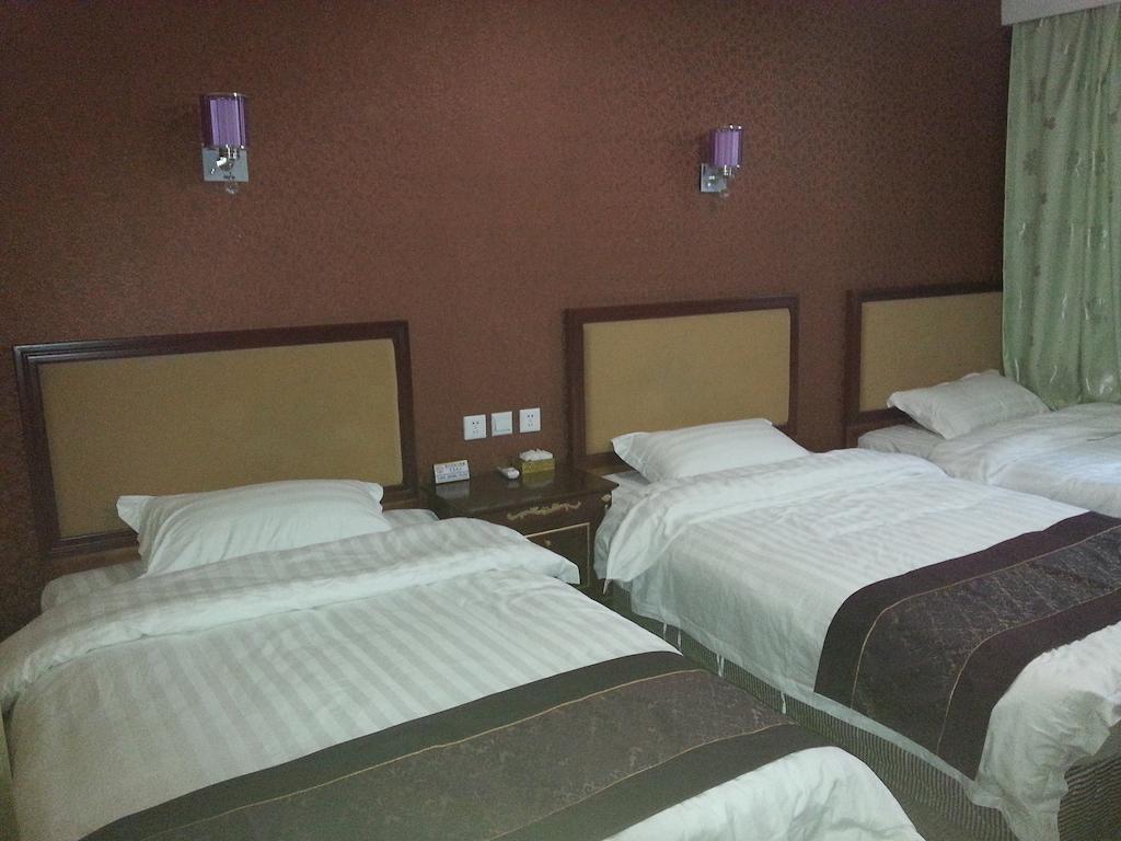 Jiuxiang Hotel Jiuzhaigou Cameră foto