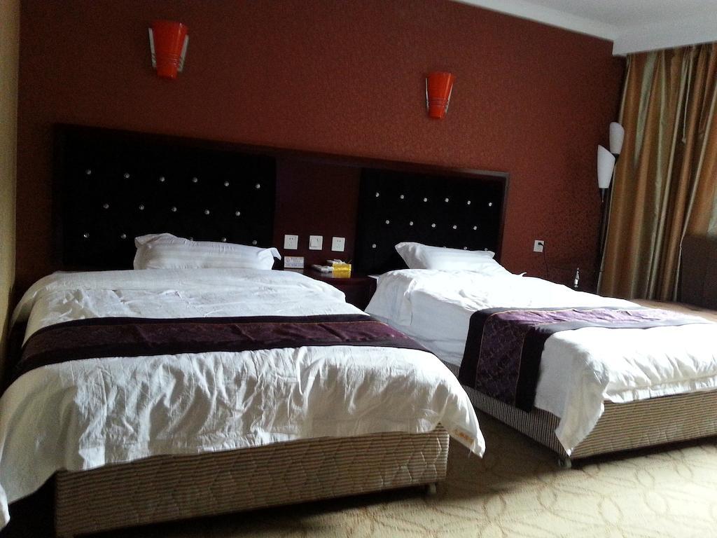 Jiuxiang Hotel Jiuzhaigou Cameră foto