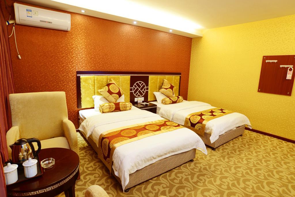 Jiuxiang Hotel Jiuzhaigou Cameră foto