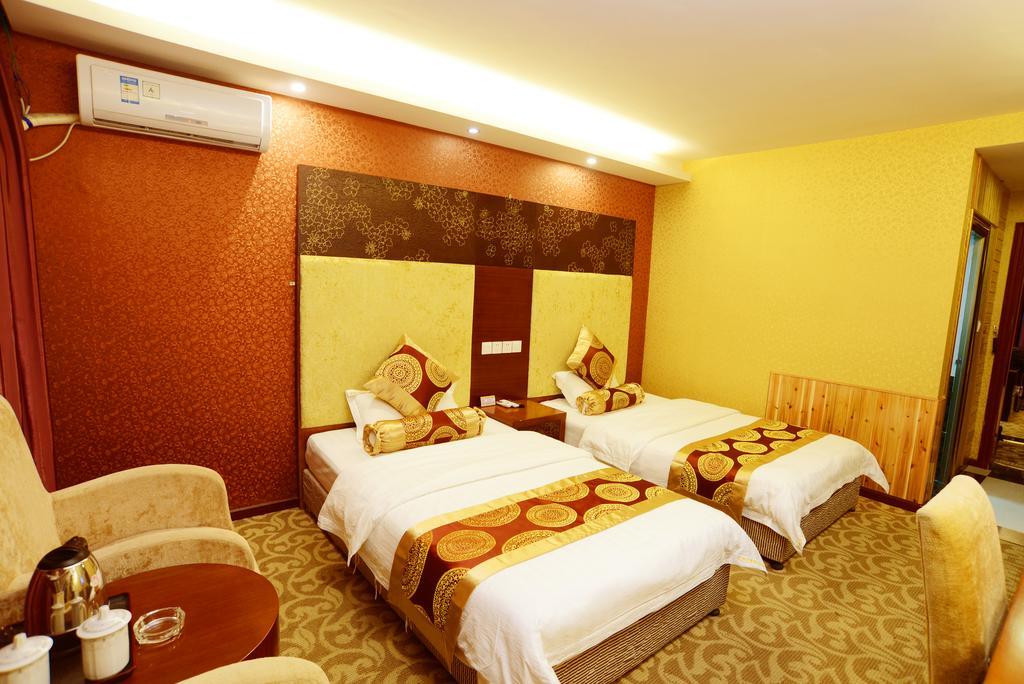 Jiuxiang Hotel Jiuzhaigou Cameră foto